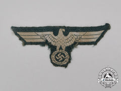 A Wehrmacht Overseas Cap Eagle; Uniform Removed