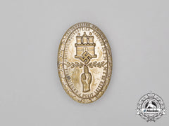 A 1934 Hamburg “Political Housekeeping” Badge