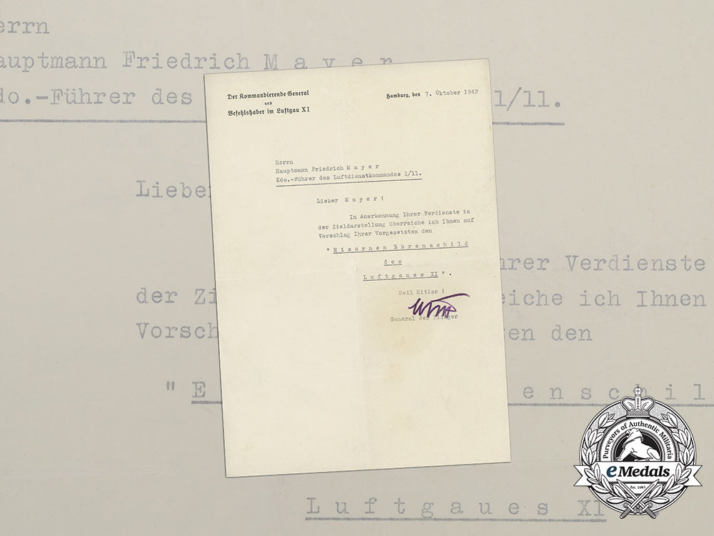 an_iron_honour_shield_of_luftgau_xi_award_document_to_hauptmann_mayer_bb_4024