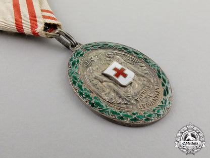 austria._an_decoration_of_the_red_cross,_silver_grade_with_war_decoration_c17-039_1