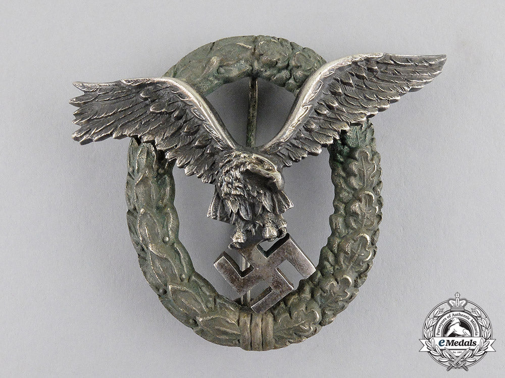 germany._a_early_luftwaffe_pilot’s_badge,_by_c._e._juncker_of_berlin_in_case_c17-3530