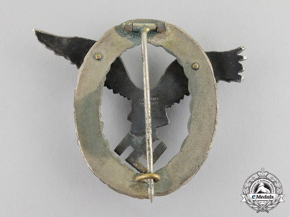 germany._a_early_luftwaffe_pilot’s_badge,_by_c._e._juncker_of_berlin_in_case_c17-3531