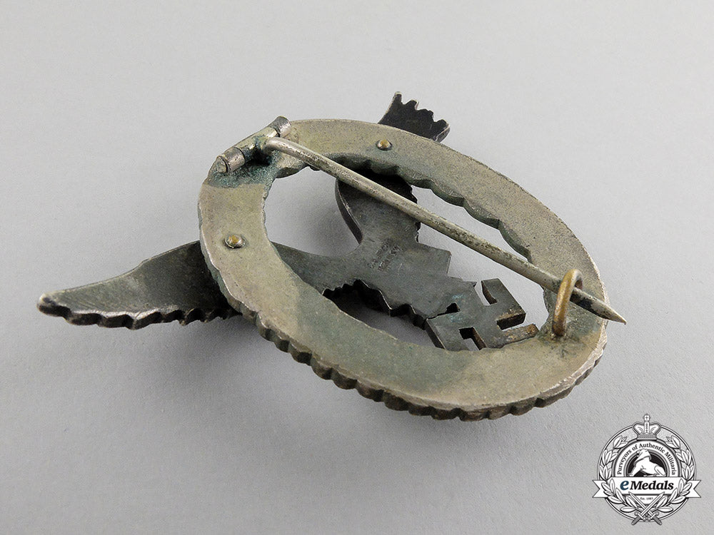 germany._a_early_luftwaffe_pilot’s_badge,_by_c._e._juncker_of_berlin_in_case_c17-3533