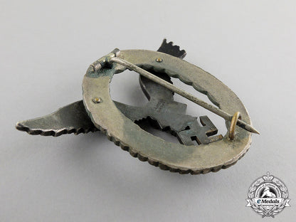 germany._a_early_luftwaffe_pilot’s_badge,_by_c._e._juncker_of_berlin_in_case_c17-3533