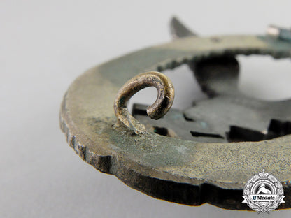 germany._a_early_luftwaffe_pilot’s_badge,_by_c._e._juncker_of_berlin_in_case_c17-3536
