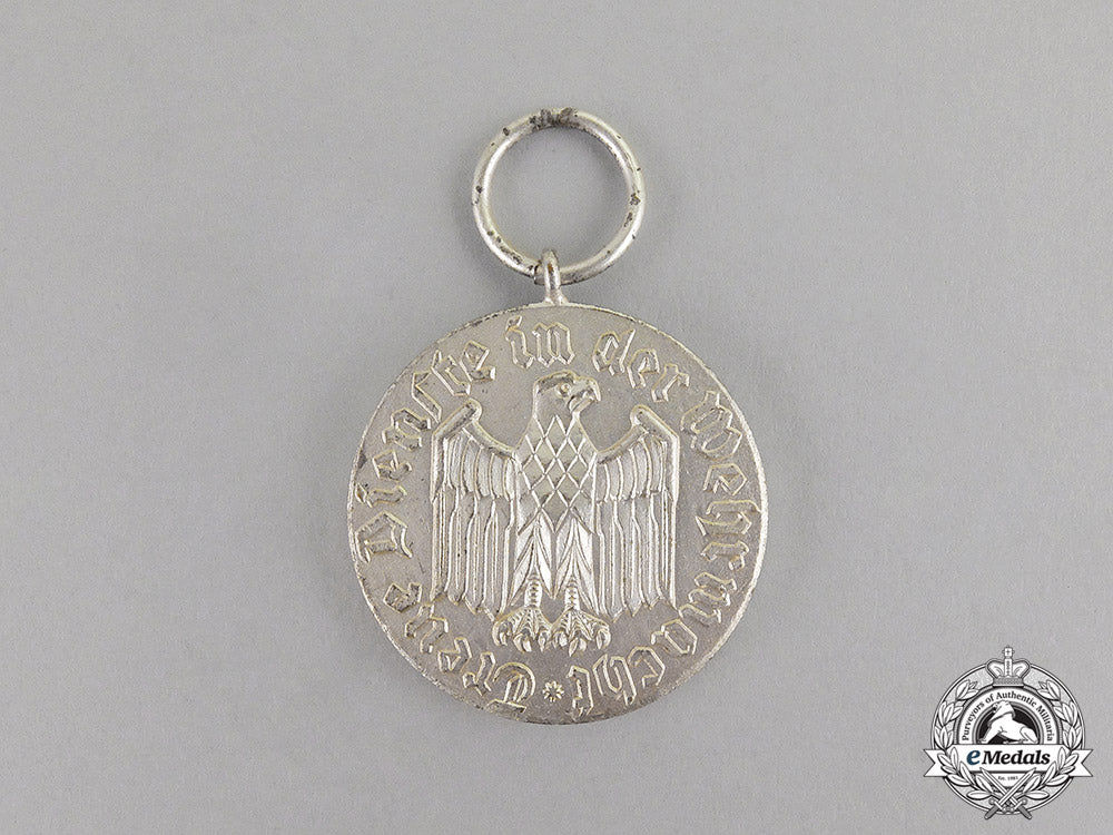 germany._two1957_version_medals_and_awards_c17-4143