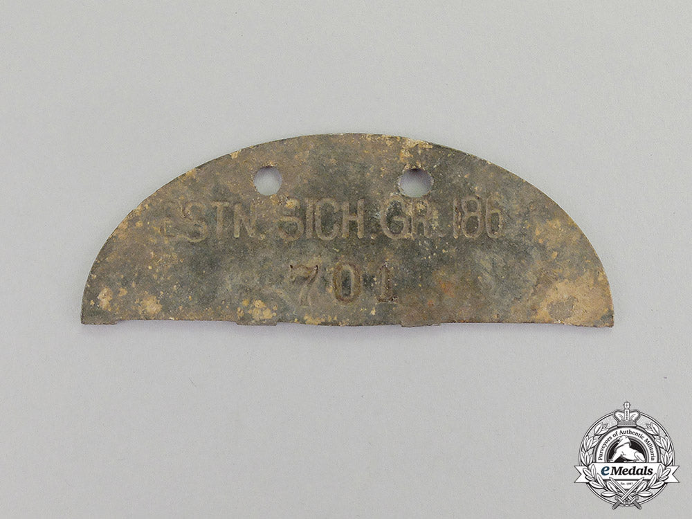 germany._a_estonian_security_group_half_dog_tag_c17-4939