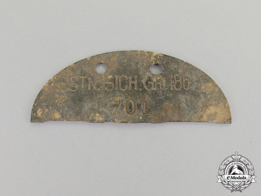 germany._a_estonian_security_group_half_dog_tag_c17-4939