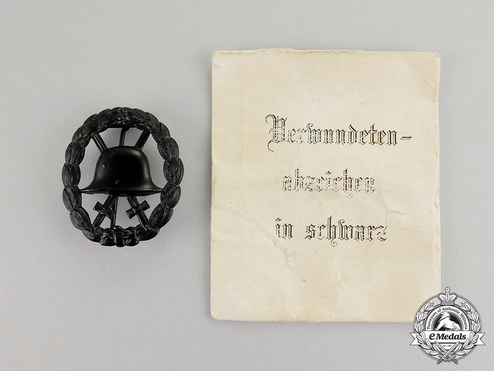 germany._a_mint_imperial_black_grade_wound_badge_in_its_packet_of_issue_c17-5078