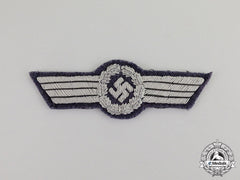 Germany. A Mint Luftwaffe Officer's Civil Fire Brigade Visor Cap Insignia