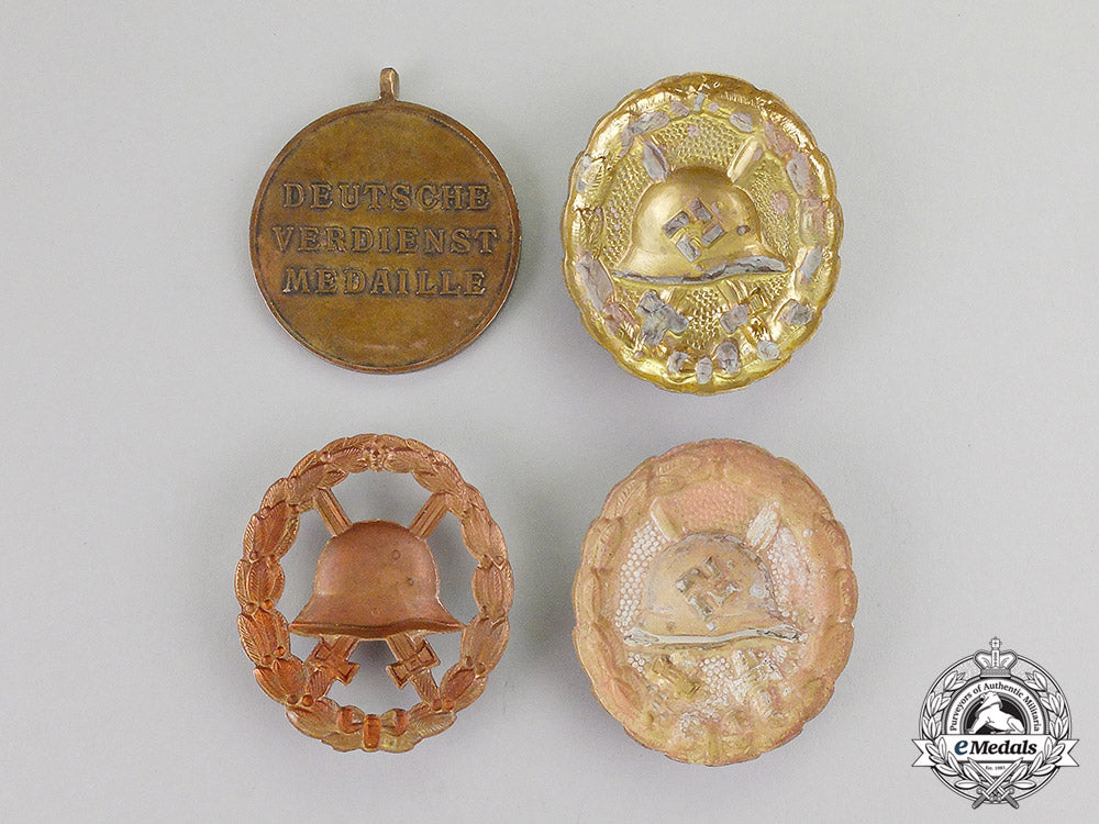 germany._four_zimmermann_recovered_first_and_second_war_badges_and_medals_c17-5684_1