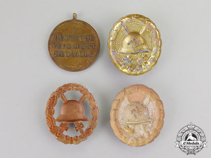 germany._four_zimmermann_recovered_first_and_second_war_badges_and_medals_c17-5684_1