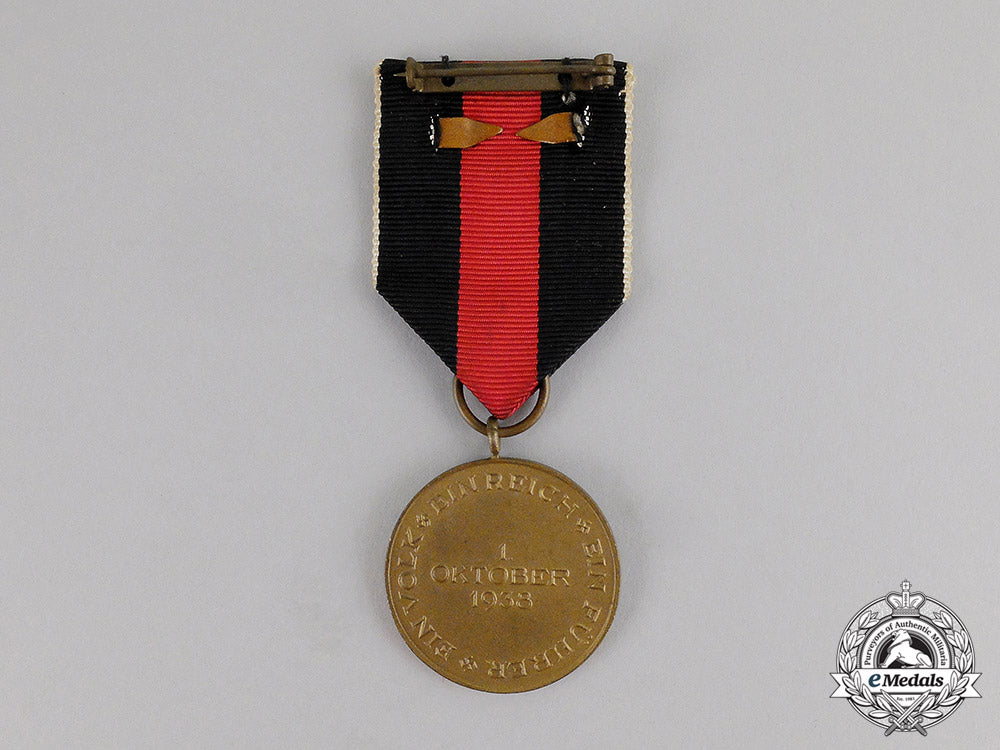 germany._a_entry_into_the_sudetenland_commemorative_medal_with_case_c17-5694
