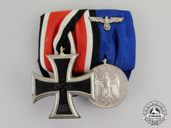 Germany. A Schinkel Iron Cross 1939 & Wehrmacht Long Service Medal Bar Grouping