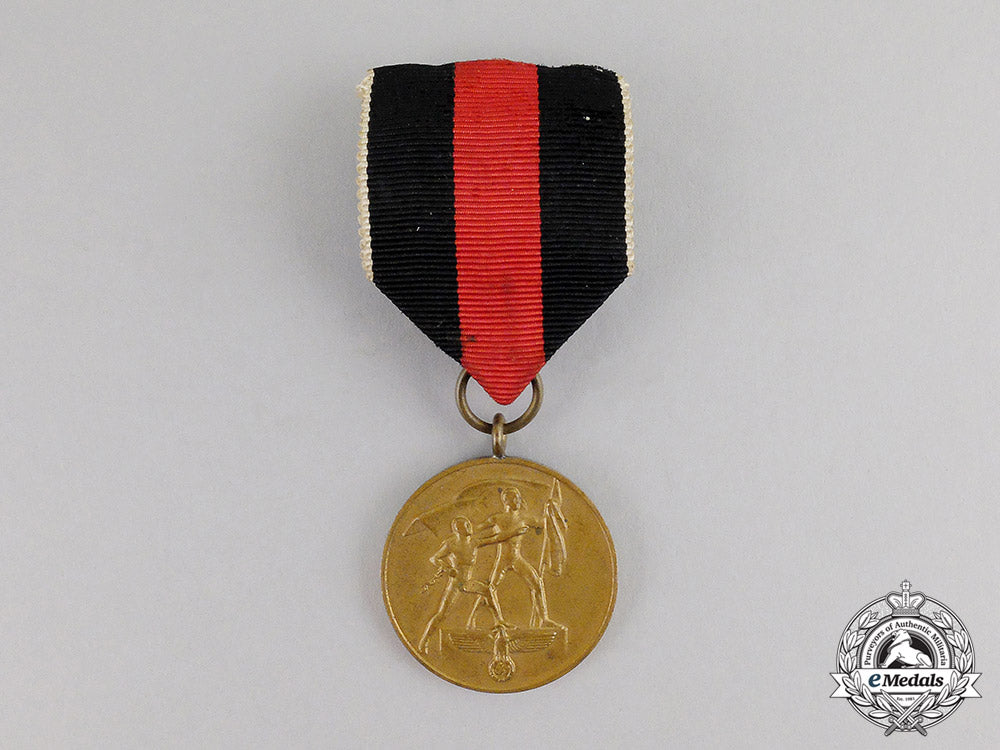 germany._an_entry_into_the_sudetenland_commemorative_medal_with_case_c17-6562