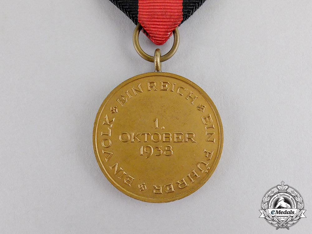 germany._an_entry_into_the_sudetenland_commemorative_medal_with_case_c17-6564