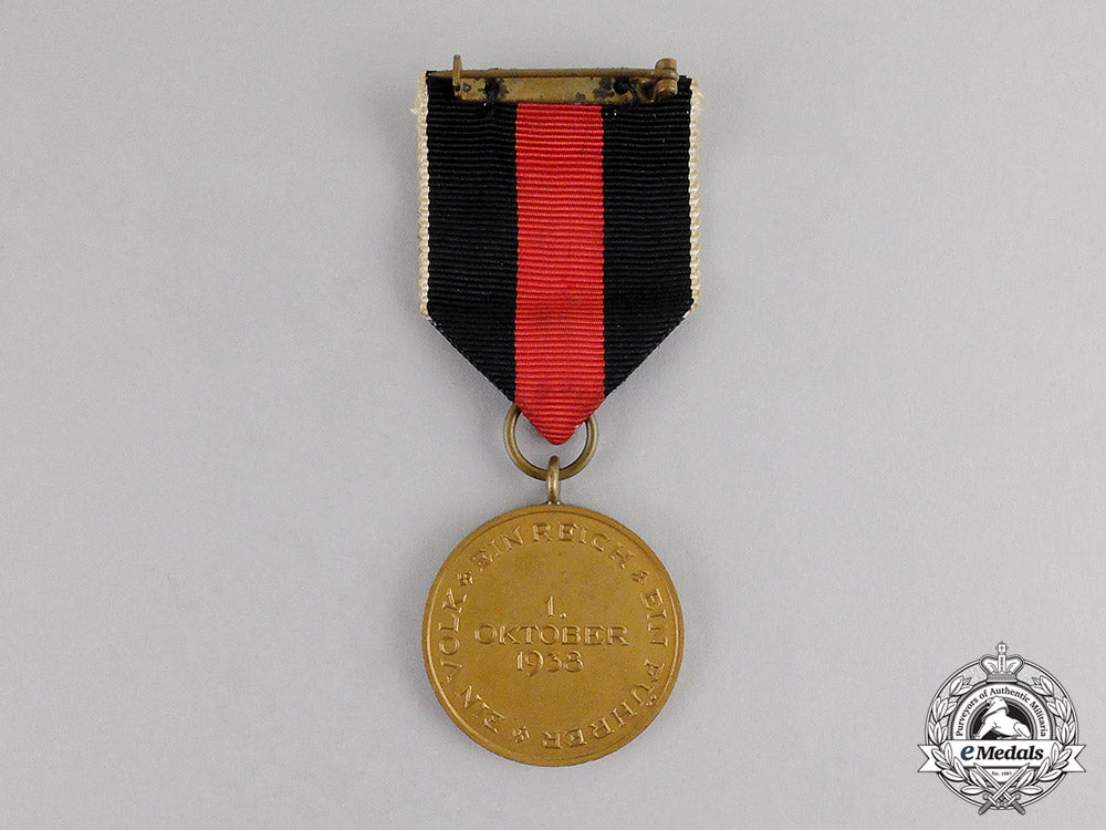 germany._an_entry_into_the_sudetenland_commemorative_medal_with_case_c17-6565