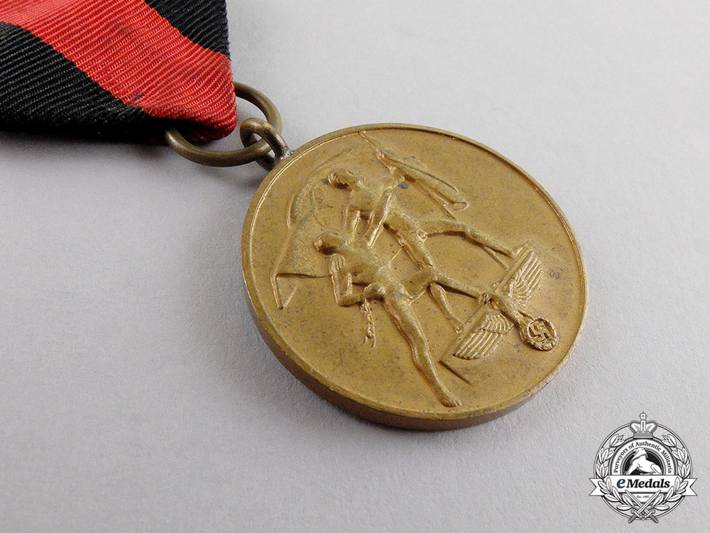germany._an_entry_into_the_sudetenland_commemorative_medal_with_case_c17-6566