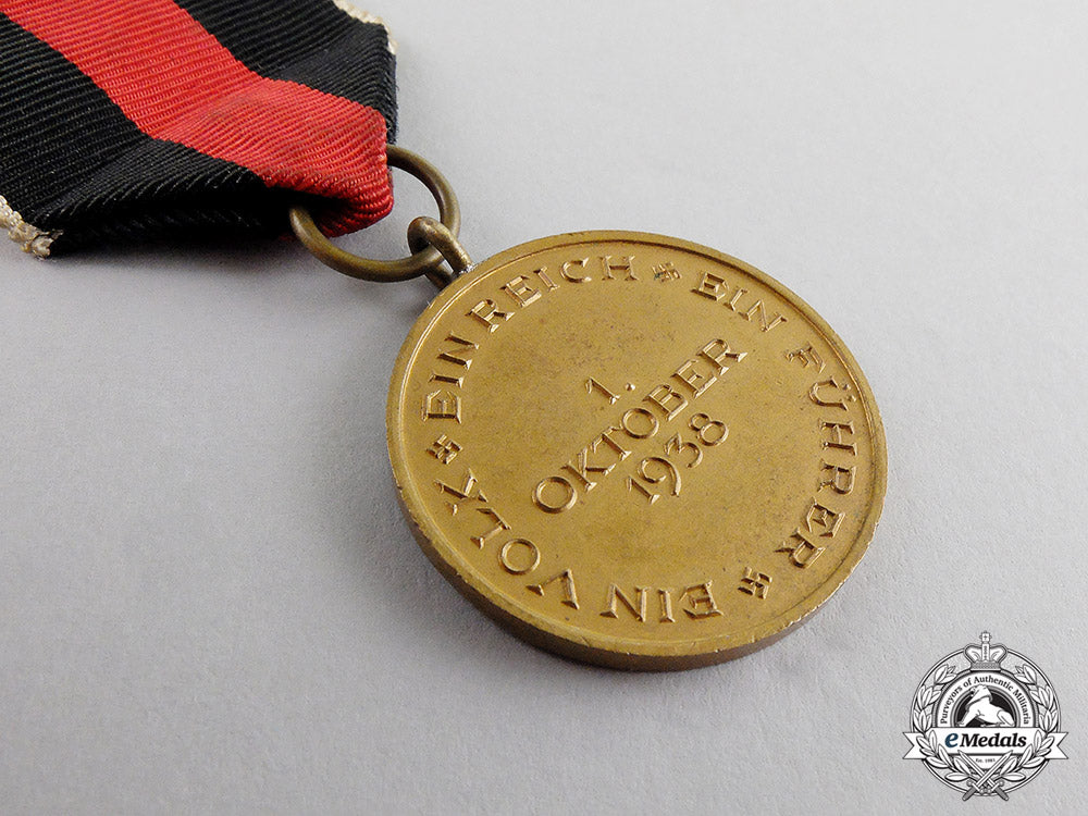 germany._an_entry_into_the_sudetenland_commemorative_medal_with_case_c17-6567