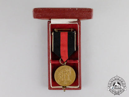 germany._an_entry_into_the_sudetenland_commemorative_medal_with_case_c17-6573