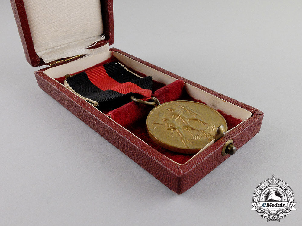 germany._an_entry_into_the_sudetenland_commemorative_medal_with_case_c17-6577