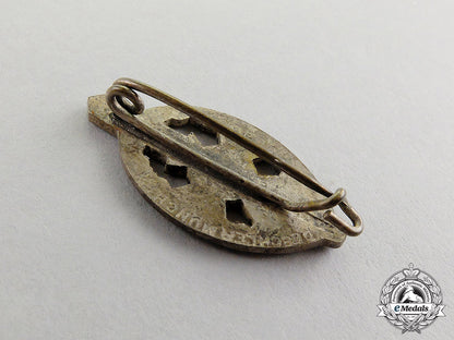 germany._an_nskov(_national_socialist_war_victim’s_care)_membership_badge_c17-6831