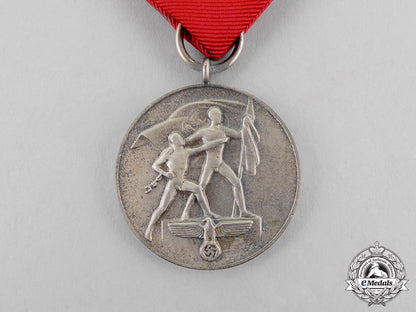 germany._a1938_austria_anschluss_medal_in_its_presentation_case_of_issue_c17-7838