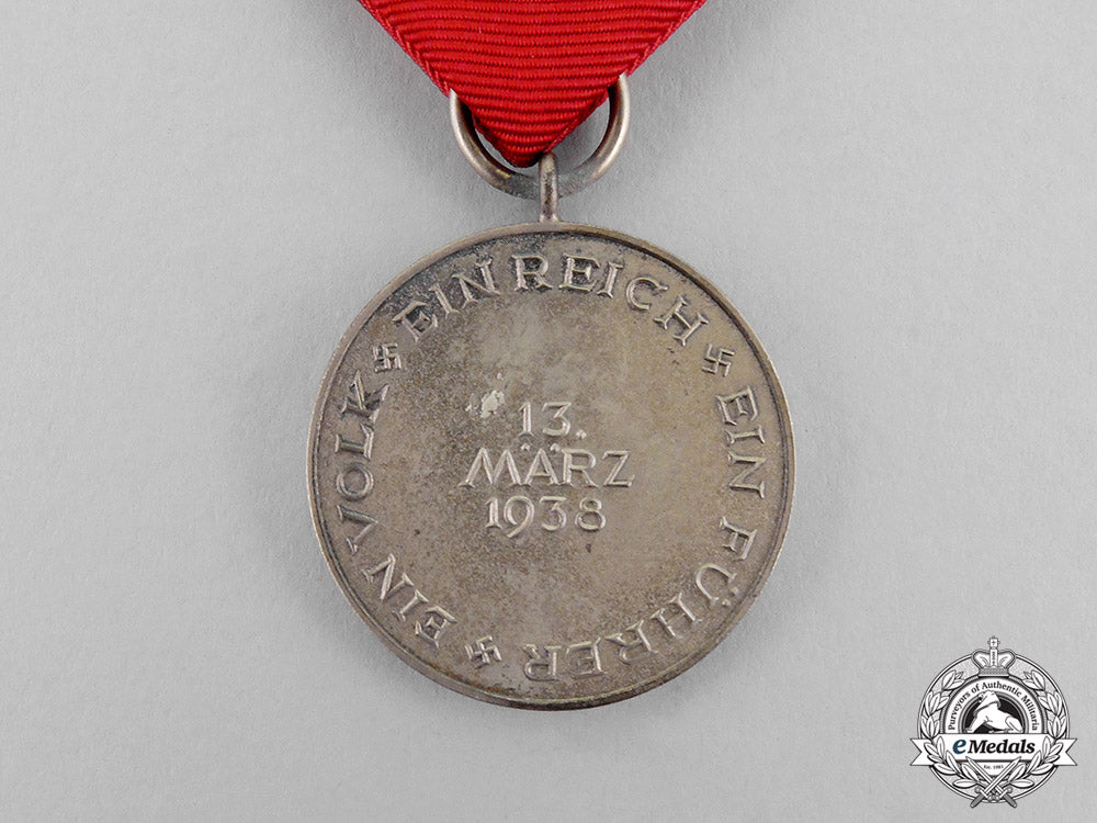 germany._a1938_austria_anschluss_medal_in_its_presentation_case_of_issue_c17-7839