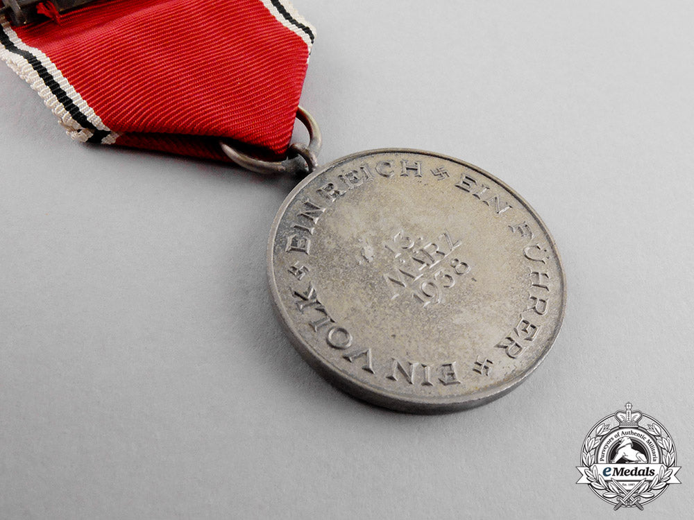 germany._a1938_austria_anschluss_medal_in_its_presentation_case_of_issue_c17-7842