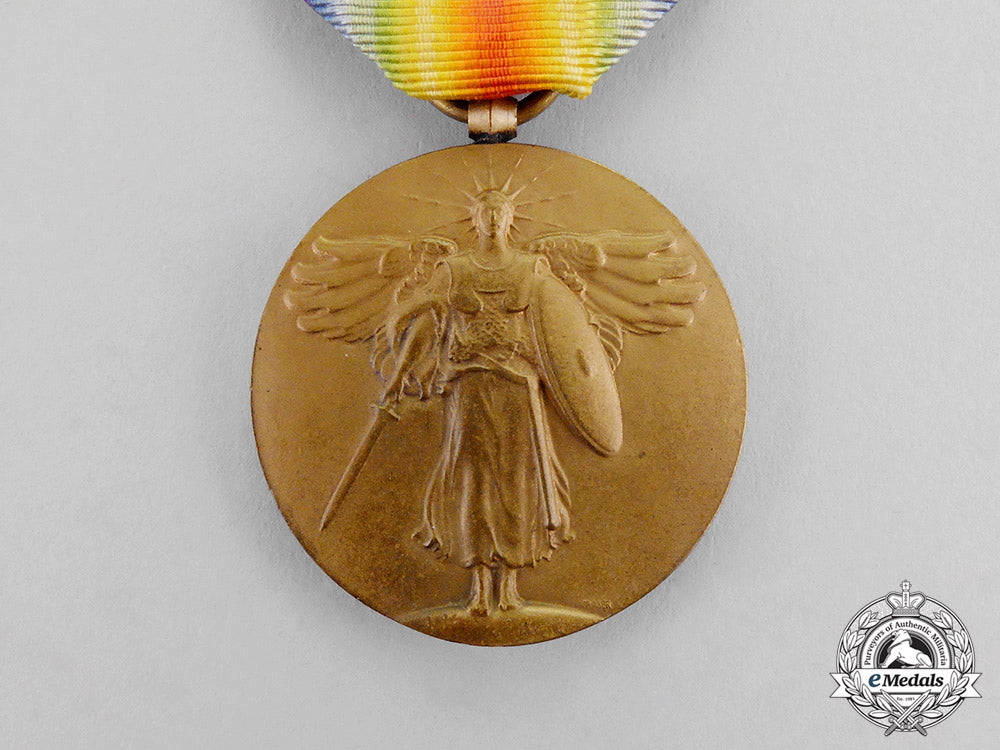 united_states._a_dsc_group_to_captain_baker_for_crossing_the_andon_river_under_fire_in1918_c17-8140