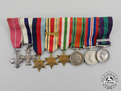 Great Britain. An Obe & Military Cross Miniature Group, C.1945