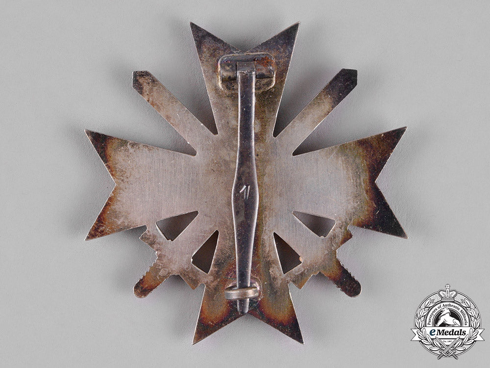 germany,_third_reich._a_mint_war_merit_cross_i_class_with_swords,_by_deschler_c18-013505