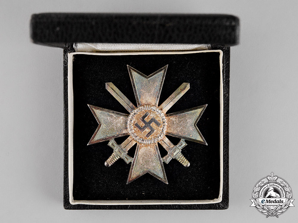 germany,_third_reich._a_mint_war_merit_cross_i_class_with_swords,_by_deschler_c18-013511