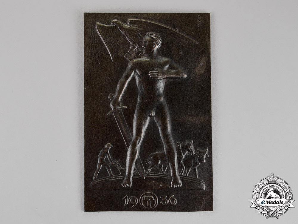 germany,_third_reich._a_patriotic_farmer’s“_sword_and_plow”_ideology_plaque,_c.1936_c18-013765_1_1