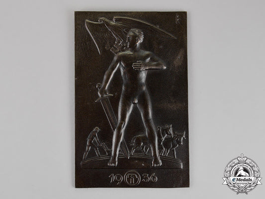 germany,_third_reich._a_patriotic_farmer’s“_sword_and_plow”_ideology_plaque,_c.1936_c18-013765_1_1