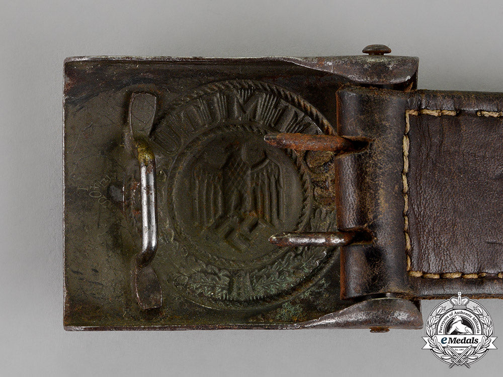 germany._a_wehrmacht_heer(_army)_standard_issue_belt_buckle_with_tab,_by_e._schneider,_dated1941_c18-014390