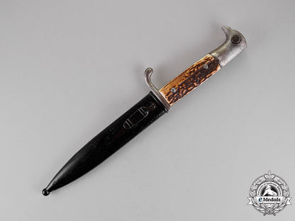 germany._a_field_converted_fighting_knife_belonging_to_a_member_of_the_waffen-_ss_c18-015576