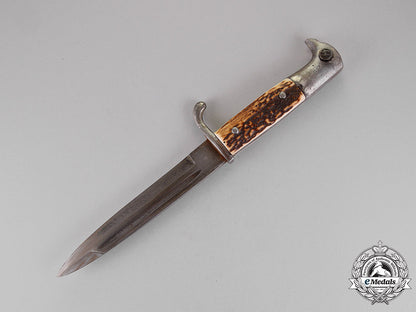 germany._a_field_converted_fighting_knife_belonging_to_a_member_of_the_waffen-_ss_c18-015578
