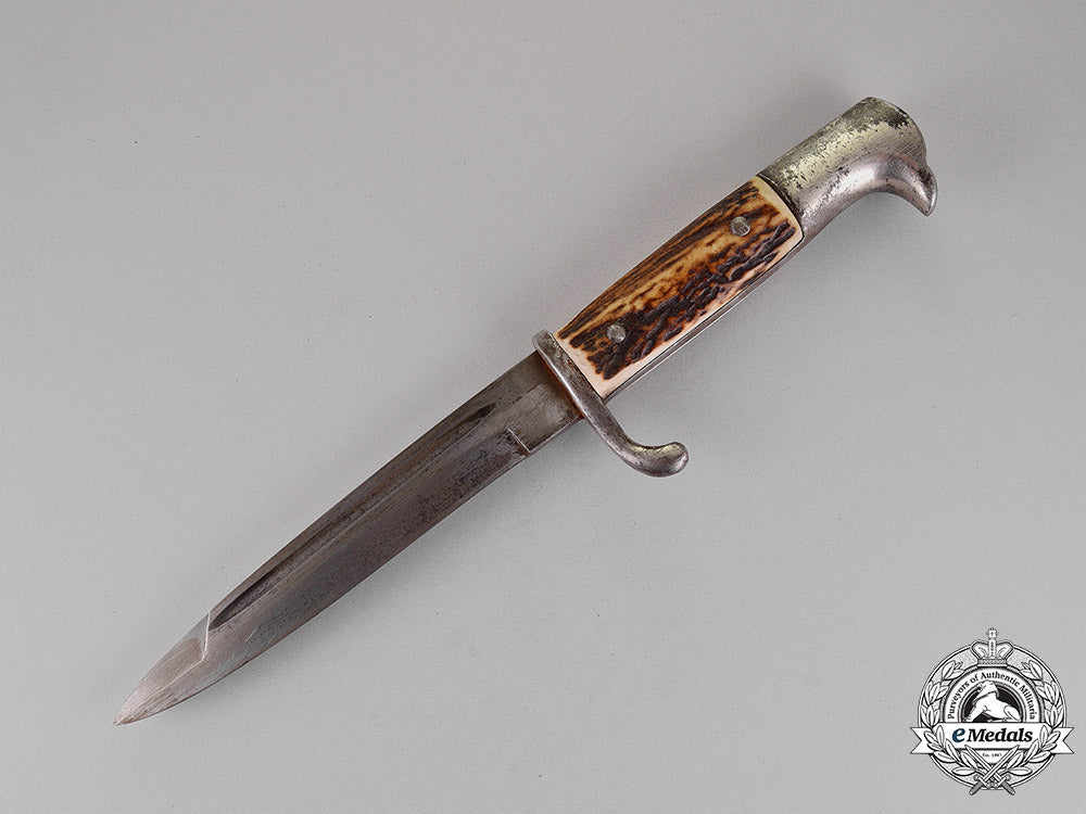 germany._a_field_converted_fighting_knife_belonging_to_a_member_of_the_waffen-_ss_c18-015579
