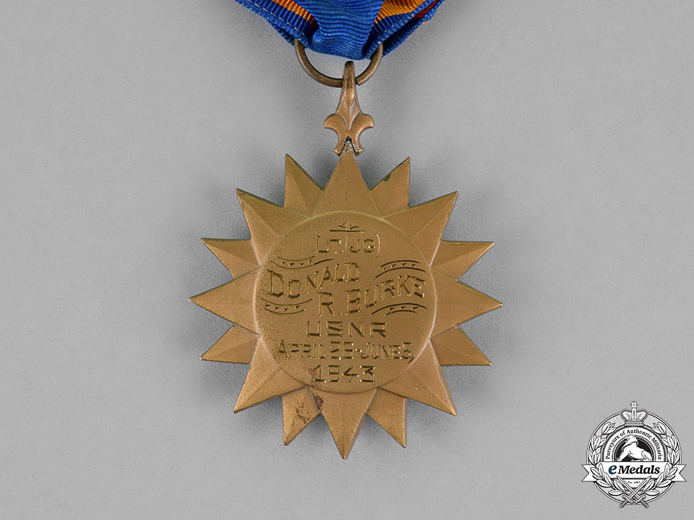 united_states._a_posthumously_awarded_air_medal_to_lieutenant_burke,_killed_in_a_flying_accident_at_la_tontouta,_new_caledonia_c18-017292