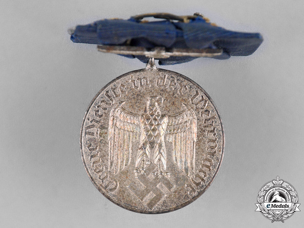 germany._a_wehrmacht4-_year_long_service_medal,_mounted_c18-018044