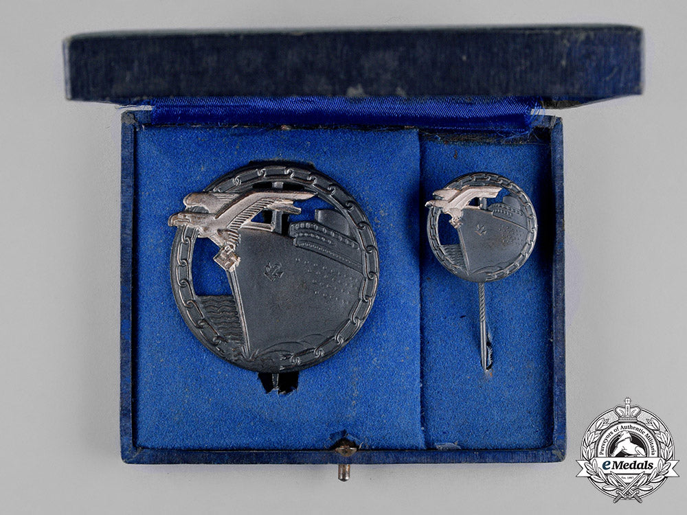 germany,_kriegsmarine._a_cased_mint_set_of_blockade_runner_badges_by_schwerin_of_berlin_c18-018284
