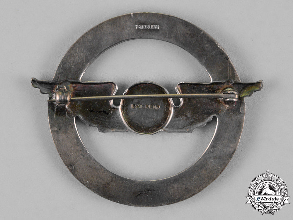 united_states._a_civil_aeronautics_administration(_caa)_war_training_service_cap_badge_c18-018319