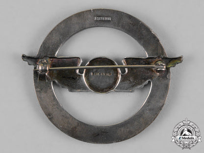 united_states._a_civil_aeronautics_administration(_caa)_war_training_service_cap_badge_c18-018319