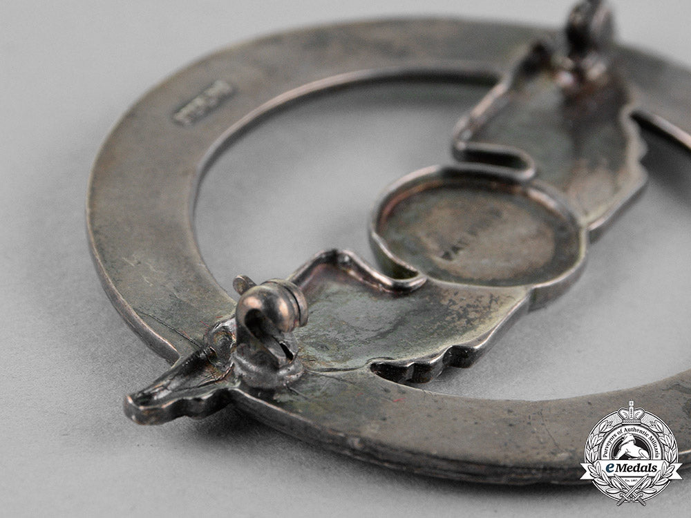 united_states._a_civil_aeronautics_administration(_caa)_war_training_service_cap_badge_c18-018322