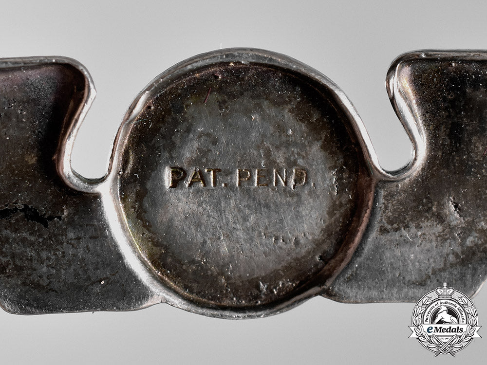 united_states._a_civil_aeronautics_administration(_caa)_war_training_service_cap_badge_c18-018324