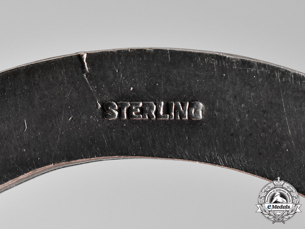 united_states._a_civil_aeronautics_administration(_caa)_war_training_service_cap_badge_c18-018325