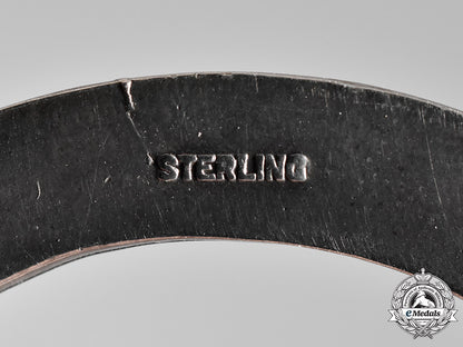 united_states._a_civil_aeronautics_administration(_caa)_war_training_service_cap_badge_c18-018325