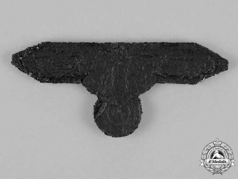 germany._an_rzm_type_ss-_officer’s_arm_eagle;_tunic_removed_c18-018649