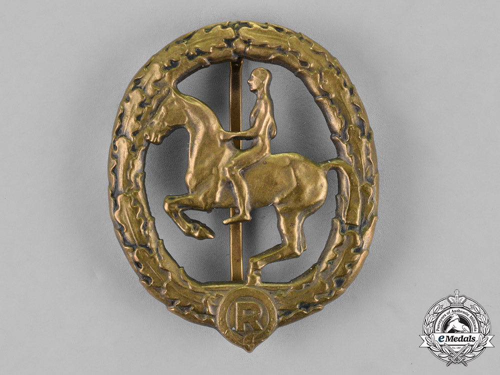 germany._an_equestrian_badge_and_stick_pin,_in_bronze,_by_christian_lauer_c18-019054